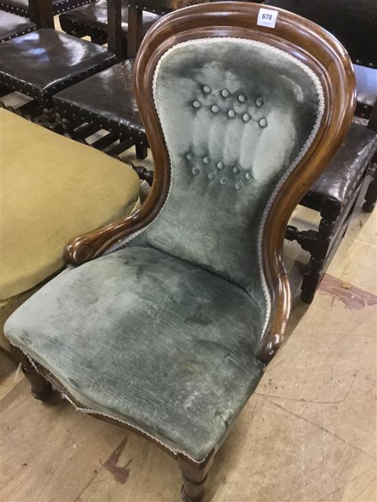 Victorian walnut nursing chair covered in green velvet